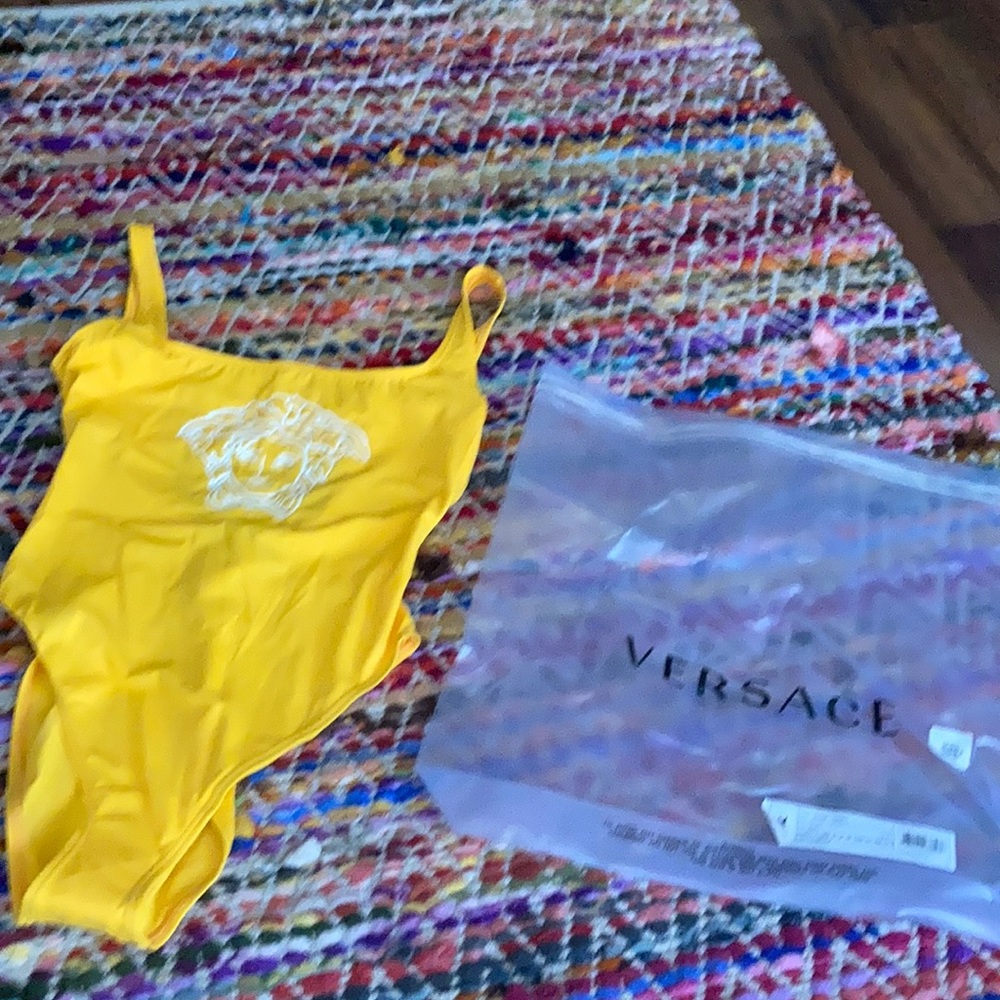 Versace name brand new bath suit one price